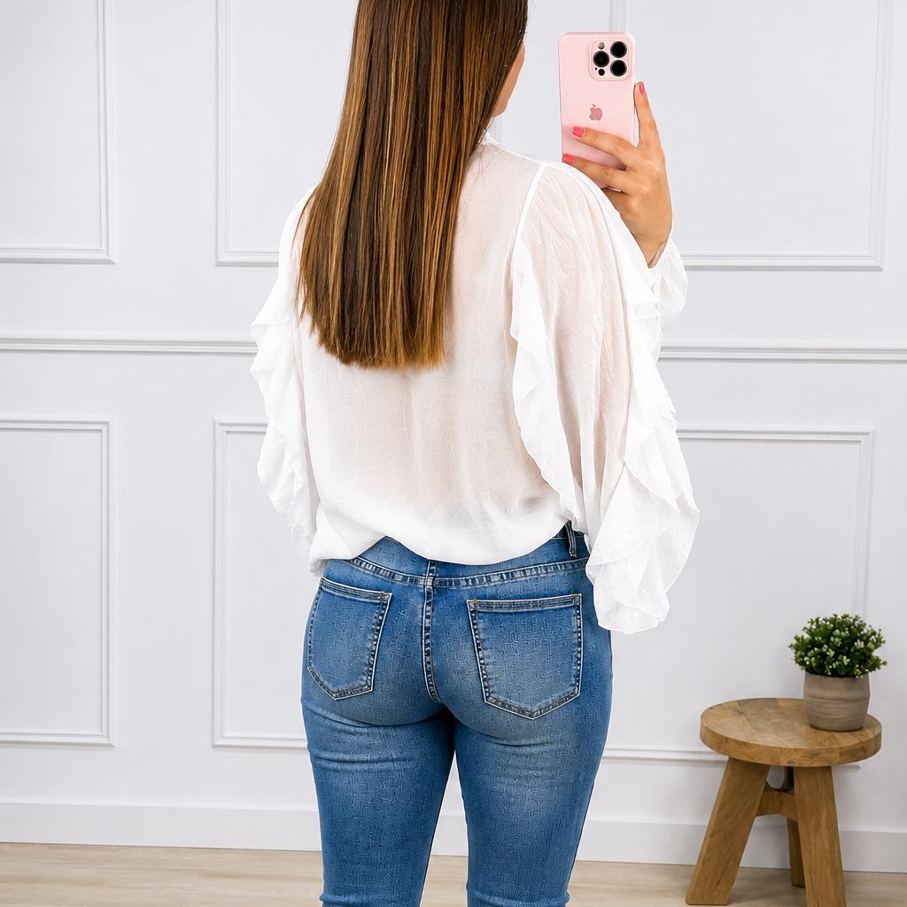 Blusa vaporosa con volantes