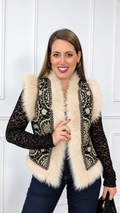 Chaleco de piel sintética negro bordado en beige