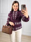 Blusa bordada con volante